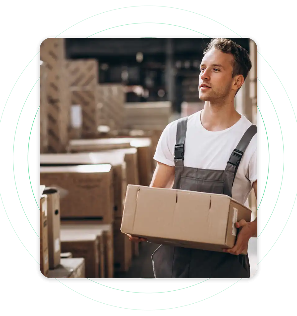 a warehouse employee moving inventory items and boxes