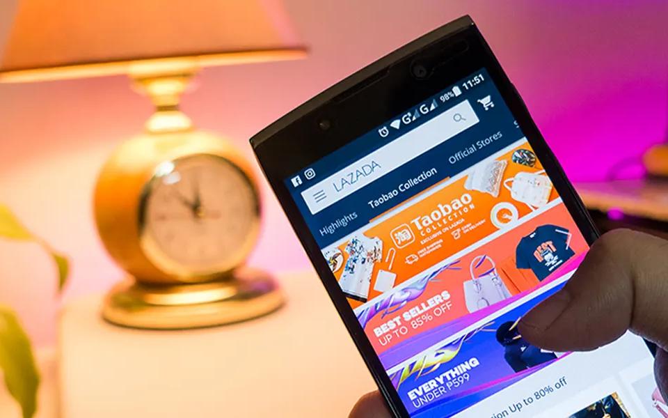 Online shopper looking at Lazada product through a mobile device | Locad