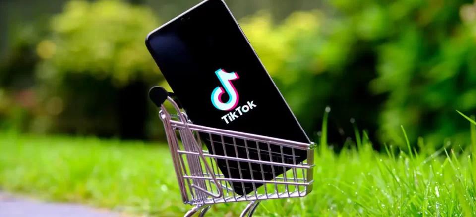 Mobile Device on a cart displaying TikTok representing e-commerce sales | Locad