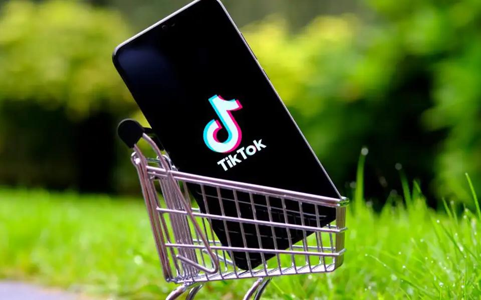 Mobile Device on a cart displaying TikTok representing e-commerce sales | Locad