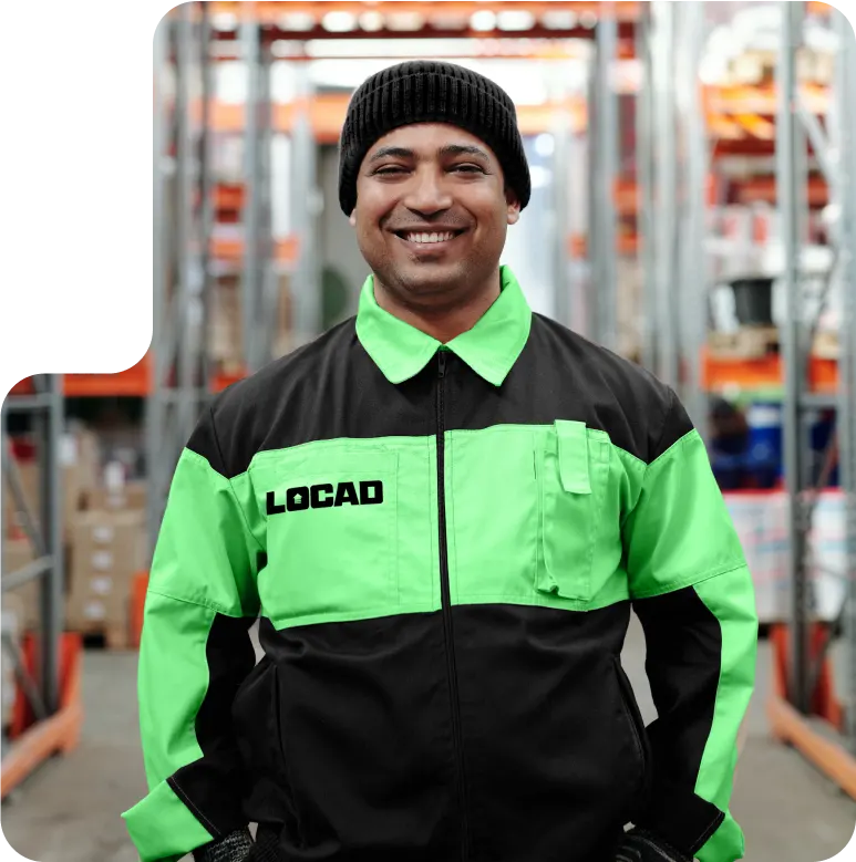 warehouse staff smiling inside a warehouse locad fulfillment